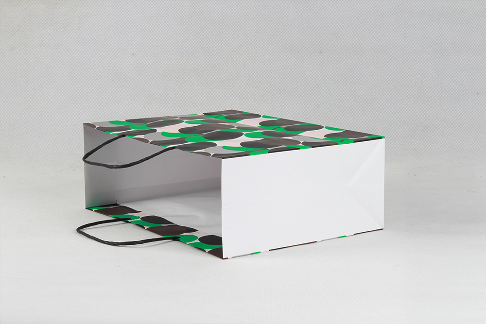 時(shí)尚圓點(diǎn)化妝品白卡紙袋定制 時(shí)尚圓點(diǎn)化妝品白卡紙袋定制